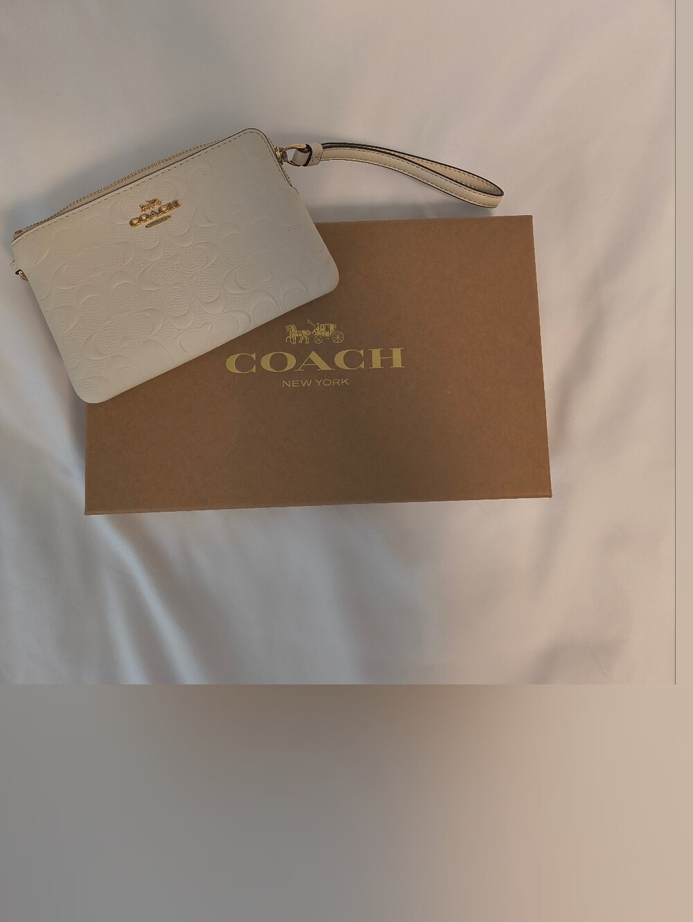 COACH White Embossed Signature Wristlet With Heat And Apple Charms
